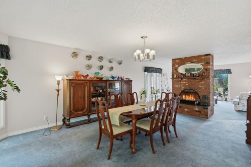11880 Clark Drive, Delta, BC - Indoor Photo Showing Dining Room With Fireplace