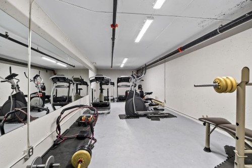 109-17727 58 Avenue, Surrey, BC - Indoor Photo Showing Gym Room