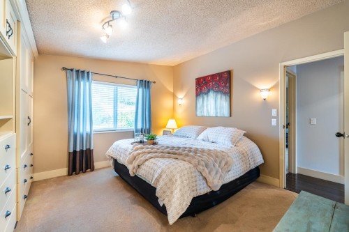 8117 Wiltshire Boulevard, Delta, BC - Indoor Photo Showing Bedroom