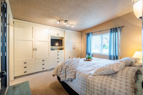 8117 Wiltshire Boulevard, Delta, BC - Indoor Photo Showing Bedroom