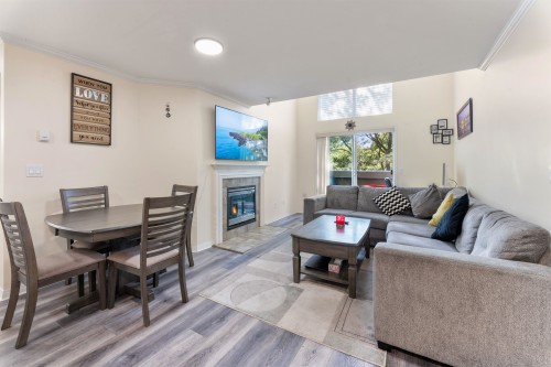 406-12155 75A Avenue, Surrey, BC - Indoor Photo Showing Living Room With Fireplace