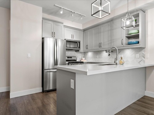 101-14605 Mcdougall Drive, Surrey, BC - Indoor Photo Showing Kitchen With Upgraded Kitchen