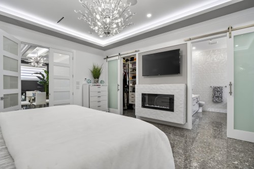 18610 57 Avenue, Surrey, BC - Indoor Photo Showing Bedroom With Fireplace