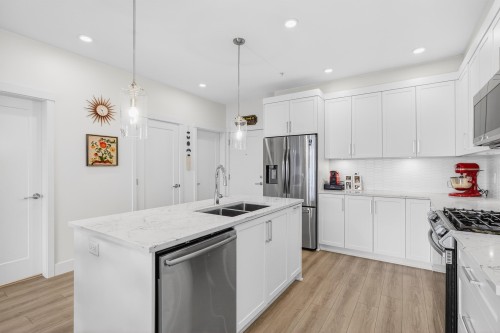 406-11865 227 Street  Maple Ridge, BC V2X 6H8