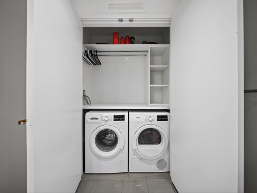 808-1955 Alpha Way, Burnaby, BC - Indoor Photo Showing Laundry Room