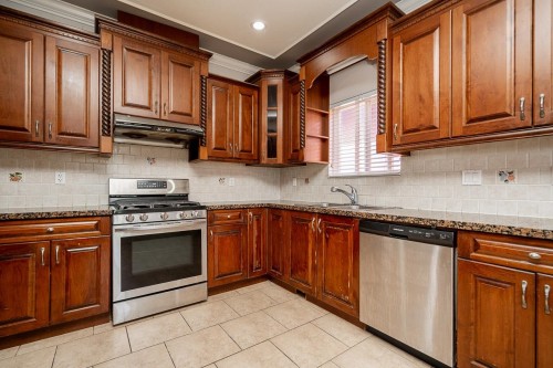 7202 Ross Street, Vancouver, BC - Indoor Photo Showing Kitchen With Double Sink