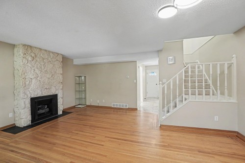 7305 Coronado Drive, Burnaby, BC - Indoor Photo Showing Living Room With Fireplace