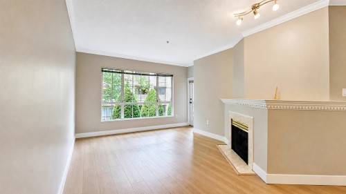211-2985 Princess Crescent, Coquitlam, BC - Indoor With Fireplace
