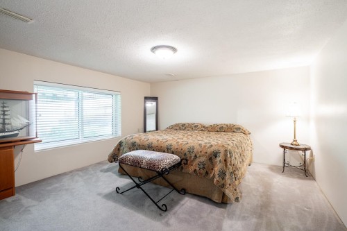 7460 Burnham Court, Burnaby, BC - Indoor Photo Showing Bedroom