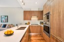 103-185 Victory Ship Way, North Vancouver, BC  - Indoor Photo Showing Kitchen With Stainless Steel Kitchen With Double Sink 