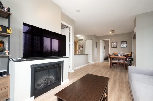 401-4250 Dawson Street, Burnaby, BC - Indoor Photo Showing Living Room With Fireplace
