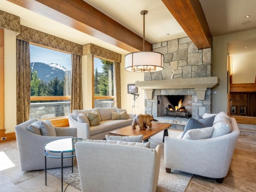 7469/73 Treetop Lane, Whistler, BC - Indoor Photo Showing Living Room With Fireplace