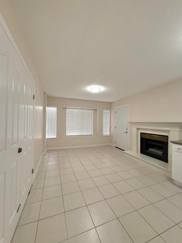 4156 Cambridge Street, Burnaby, BC - Indoor Photo Showing Other Room With Fireplace