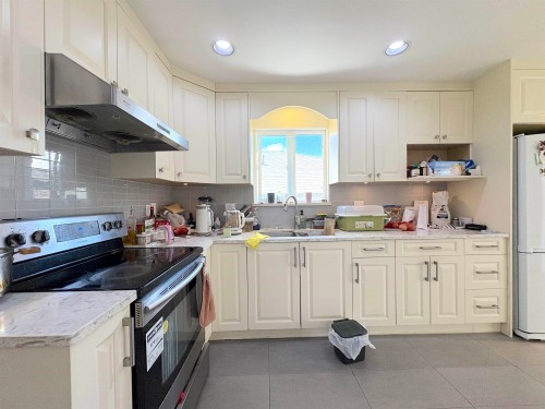 4156 Cambridge Street, Burnaby, BC - Indoor Photo Showing Kitchen With Double Sink