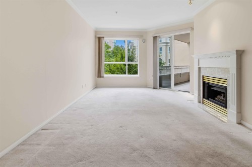 226-3098 Guildford Way, Coquitlam, BC - Indoor With Fireplace
