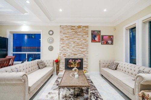 1838 49Th Avenue E, Vancouver, BC - Indoor Photo Showing Living Room With Fireplace