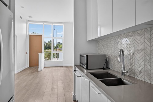 3559 Kent Avenue North E, Vancouver, BC - Indoor Photo Showing Kitchen With Double Sink