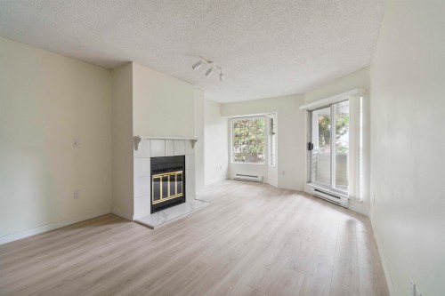 218-7591 Moffatt Road, Richmond, BC - Indoor With Fireplace
