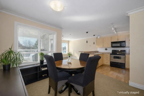 201-128 21st Street W North Vancouver, BC V7M 1Y9
