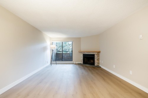 254-7293 Moffatt Road, Richmond, BC - Indoor Photo Showing Living Room With Fireplace