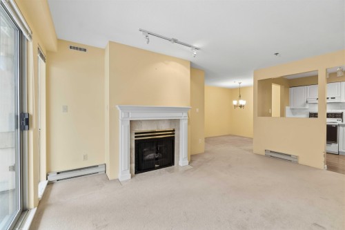 202-1148 Westwood Street, Coquitlam, BC - Indoor With Fireplace