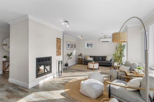 10-3459 River Road, Delta, BC - Indoor Photo Showing Living Room With Fireplace