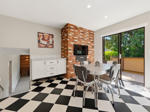 1390 Eastlawn Drive, Burnaby, BC - Indoor Photo Showing Dining Room With Fireplace