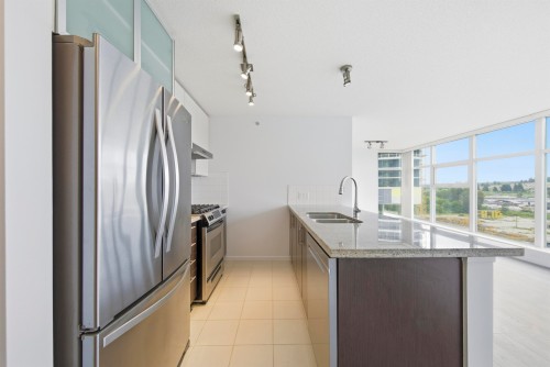 1006-2289 Yukon Crescent, Burnaby, BC - Indoor Photo Showing Kitchen With Double Sink With Upgraded Kitchen