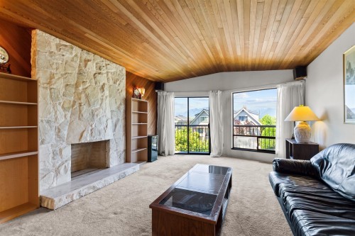 2986 3Rd Avenue E, Vancouver, BC - Indoor Photo Showing Living Room With Fireplace