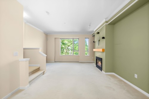 131-9229 University Crescent, Burnaby, BC - Indoor Photo Showing Other Room With Fireplace