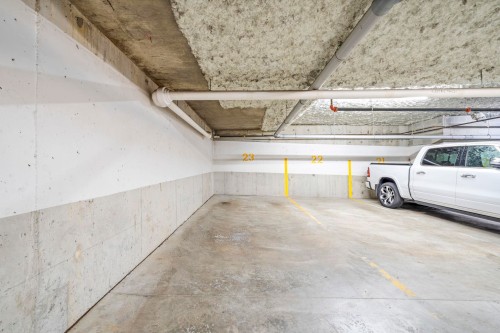 131-9229 University Crescent, Burnaby, BC - Indoor Photo Showing Garage