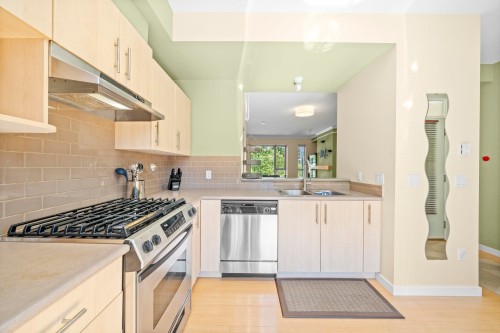 131-9229 University Crescent, Burnaby, BC - Indoor Photo Showing Kitchen With Upgraded Kitchen