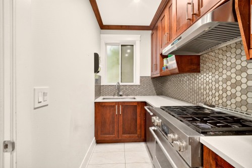 5886 Sherbrooke Street, Vancouver, BC - Indoor Photo Showing Kitchen With Double Sink