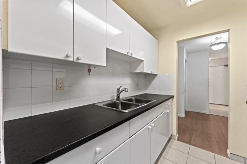 108-1420 8Th Avenue E, Vancouver, BC - Indoor Photo Showing Kitchen With Double Sink