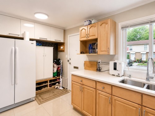 6878 Arlington Street, Vancouver, BC - Indoor Photo Showing Kitchen With Double Sink