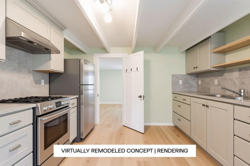 264 Queens Road W, North Vancouver, BC - Indoor Photo Showing Kitchen With Double Sink