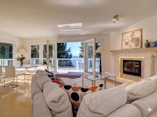 4947 Sunshine Coast Highway, Sechelt, BC - Indoor Photo Showing Living Room With Fireplace