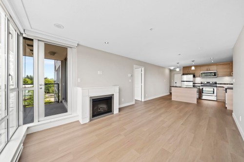 604-12079 Harris Road, Pitt Meadows, BC - Indoor With Fireplace