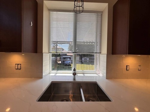 Upper-21292 123 Ave, Maple Ridge, BC - Indoor Photo Showing Kitchen With Double Sink