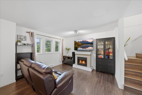 1-7128 17Th Avenue, Burnaby, BC - Indoor Photo Showing Living Room With Fireplace
