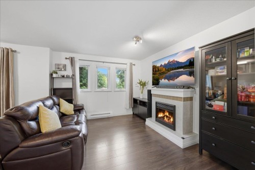 1-7128 17Th Avenue, Burnaby, BC - Indoor Photo Showing Living Room With Fireplace