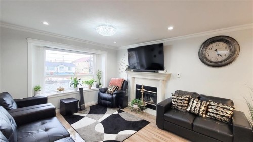 7480 Main Street, Vancouver, BC - Indoor Photo Showing Living Room With Fireplace