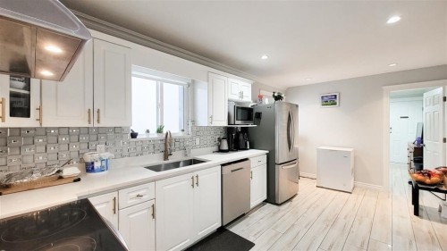 7480 Main Street, Vancouver, BC - Indoor Photo Showing Kitchen With Stainless Steel Kitchen