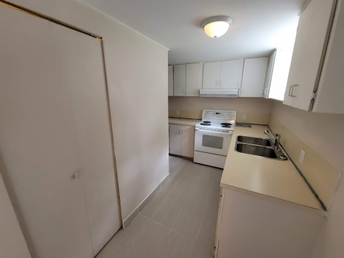 8374 11Th Avenue, Burnaby, BC - Indoor Photo Showing Kitchen With Double Sink