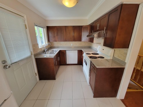 8374 11Th Avenue, Burnaby, BC - Indoor Photo Showing Kitchen With Double Sink