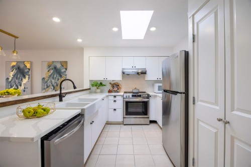 409-3580 41 W, Vancouver, BC - Indoor Photo Showing Kitchen With Upgraded Kitchen