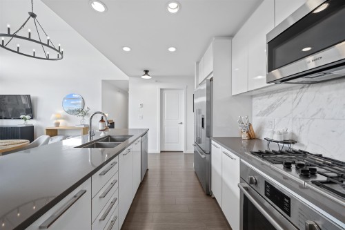 502-3263 Pierview Crescent, Vancouver, BC - Indoor Photo Showing Kitchen With Double Sink With Upgraded Kitchen