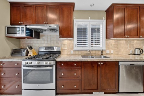 4549 12Th Avenue W, Vancouver, BC - Indoor Photo Showing Kitchen With Double Sink