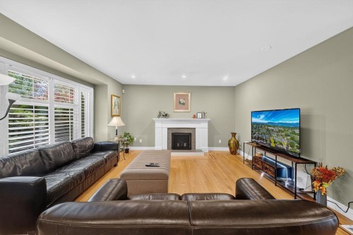 4549 12Th Avenue W, Vancouver, BC - Indoor Photo Showing Living Room With Fireplace