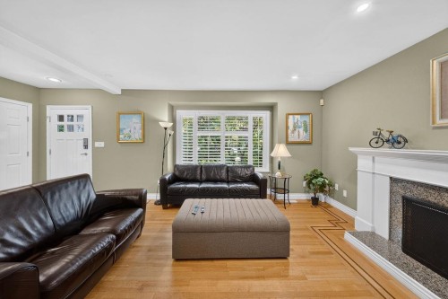 4549 12Th Avenue W, Vancouver, BC - Indoor Photo Showing Living Room With Fireplace